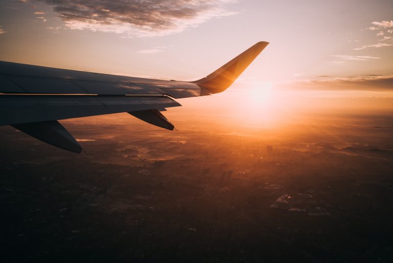 an airplane wing in the sky