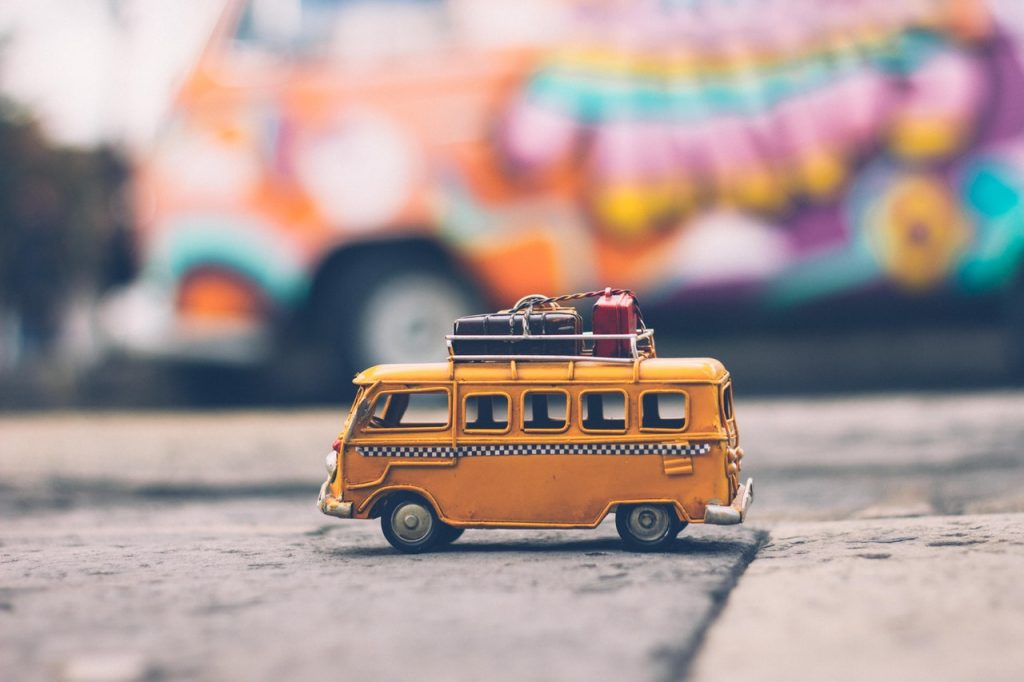 a toy bus on a road