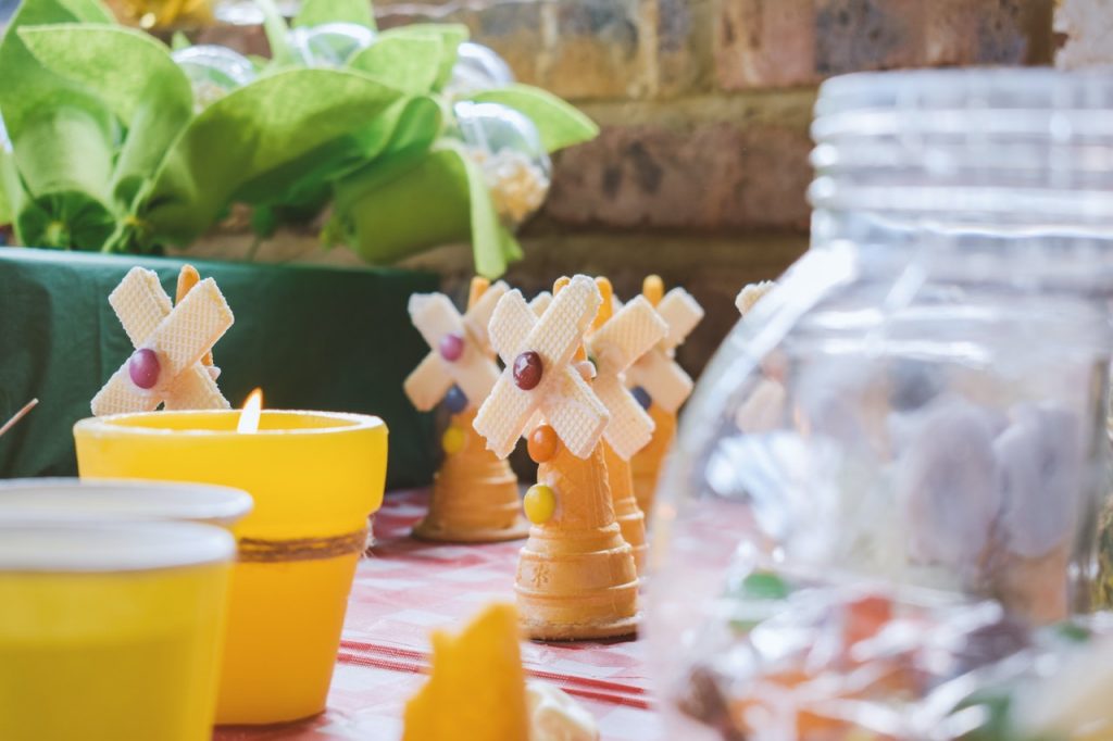 a group of vases with flowers