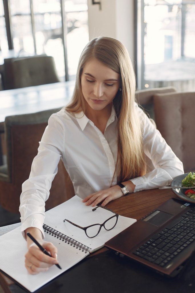 a woman sitting at a desk