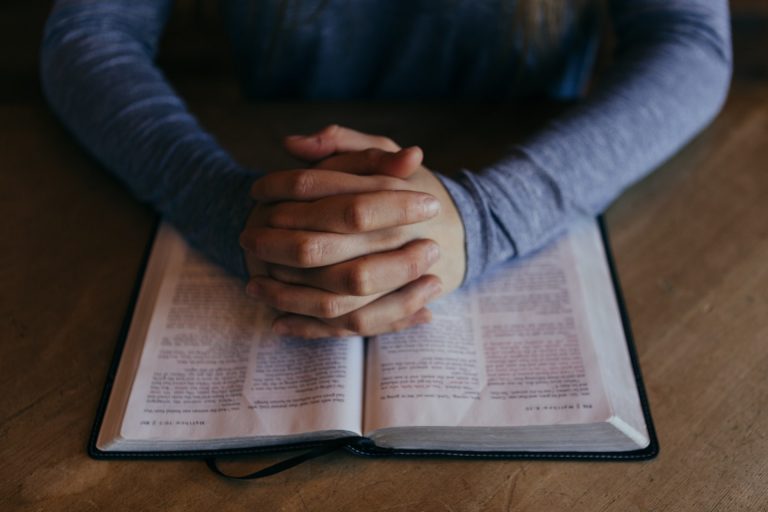 a person holding a piece of paper