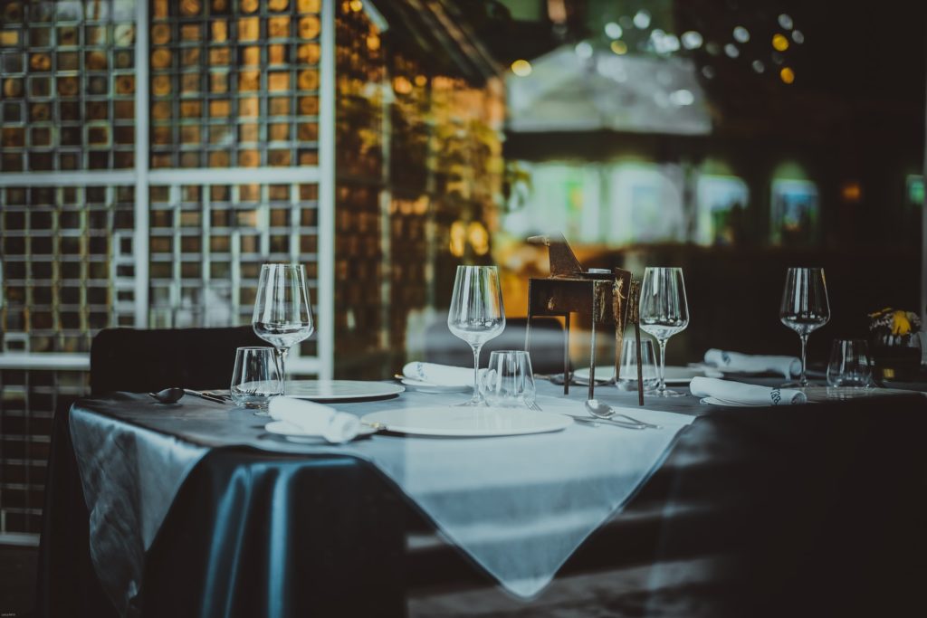 a table with wine glasses