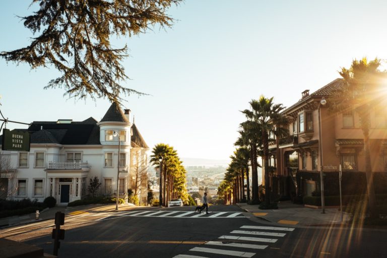 a street with buildings and trees