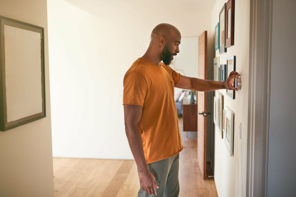 a man looking at a mirror