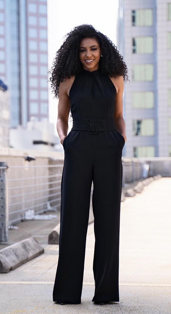 a woman wearing a black dress