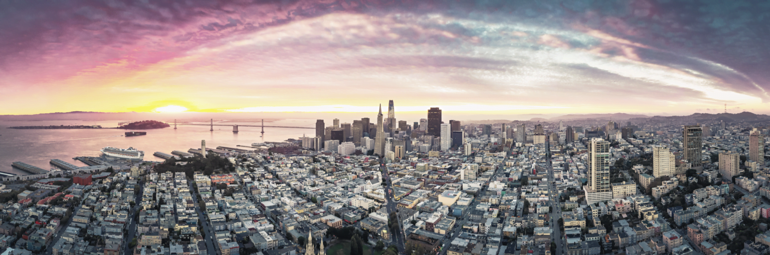 a city skyline at sunset