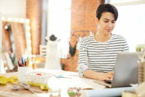a woman working on a laptop