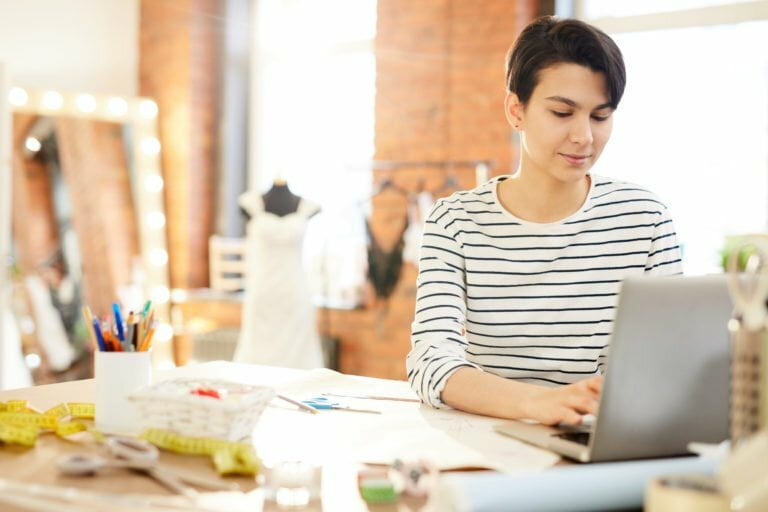 a woman working on a laptop