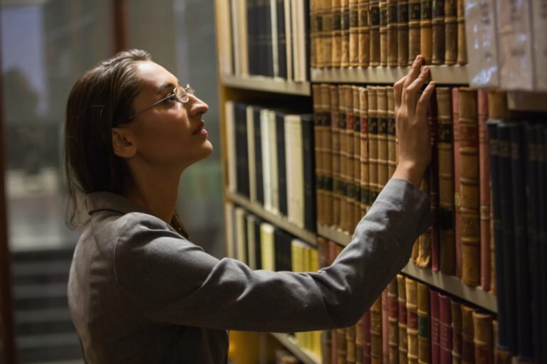 WOMAN AT A LIBRARY