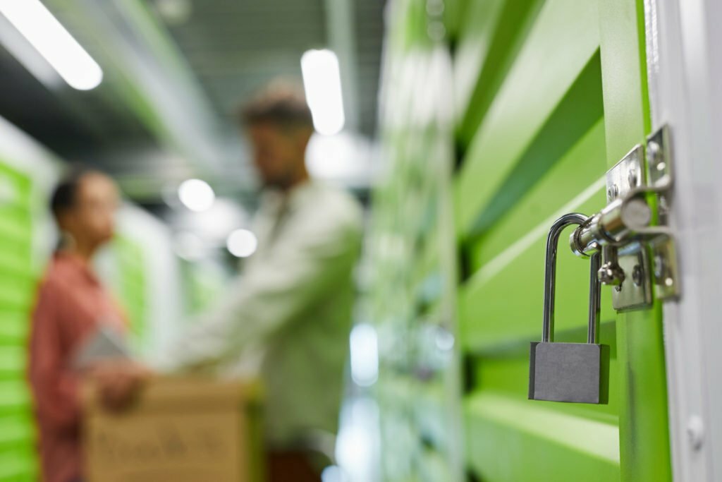 a couple standing by a Self Storage Unit