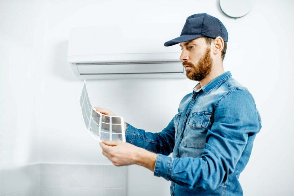 Man serving the air conditioner