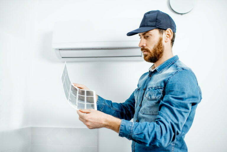 Man serving the air conditioner