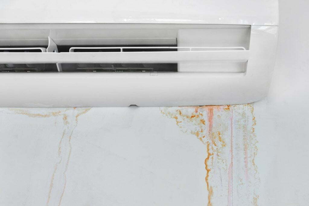 Wall with mold stain due to air conditioner leakage