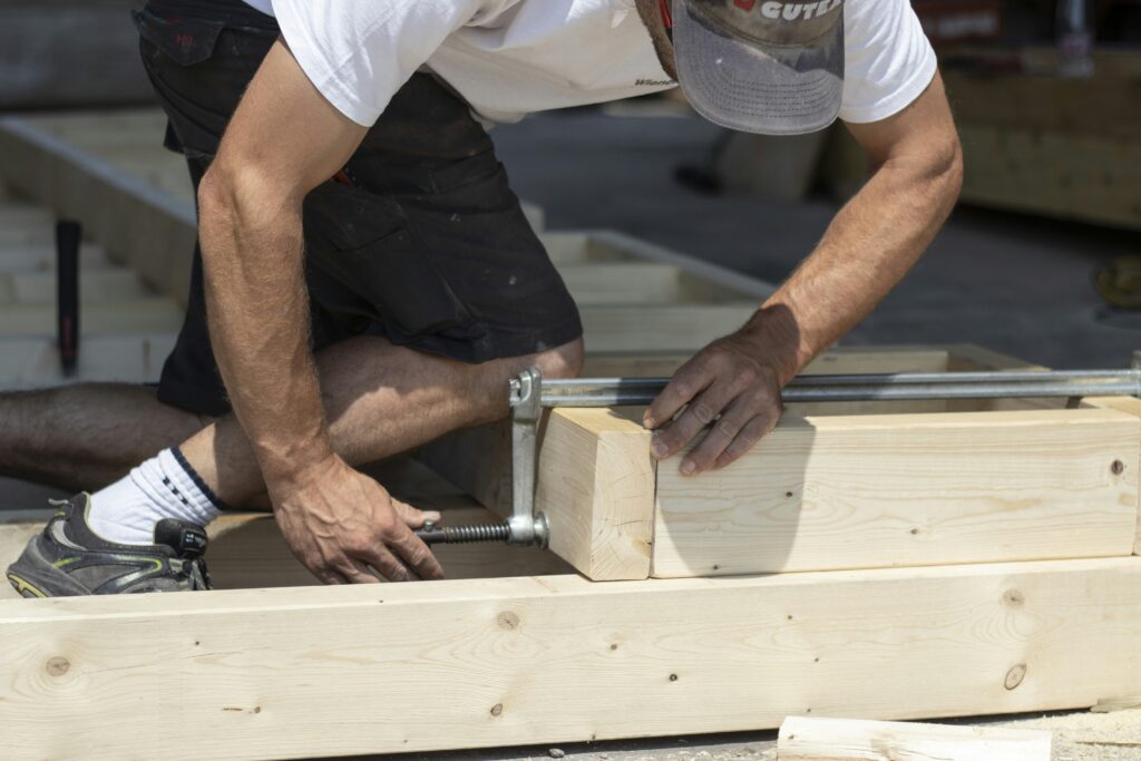 a man working on a piece of wood