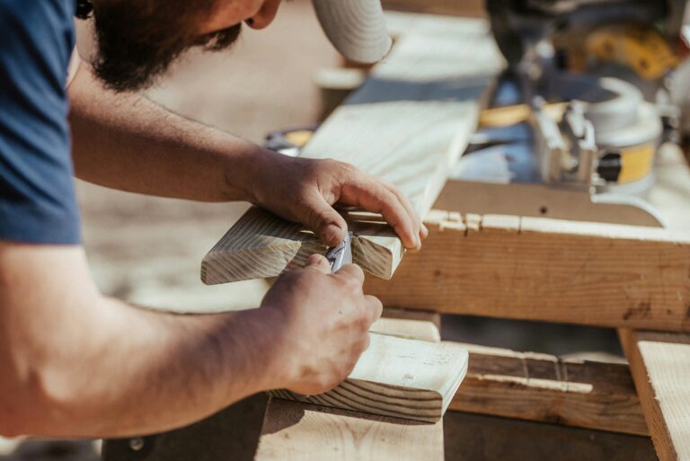 a man cutting wood
